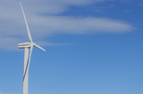 Mining Photo Stock Library - close up photo of large wind generator.  blue sky behind. ( Weight: 1  New Image: NO)