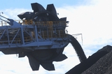 Mining Photo Stock Library - close up silhouette of a coal loader stockpiling coal. ( Weight: 1  New Image: NO)