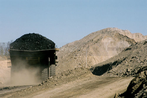 Loaded coal truck on haul road - Mining Photo Stock Library