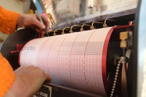 Computer printed graph confirms information for drill rig workers. - Mining Photo Stock Library