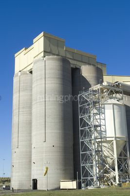 Coal surface storage silo towers at underground coal mine. conveyors at all angles attached. vertical shot. - Mining Photo Stock Library