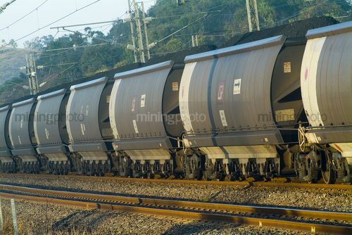 Loaded coal rail carriages - Mining Photo Stock Library