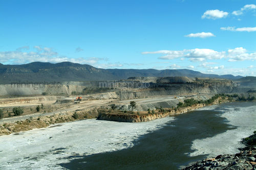 Open cut coal slurry waste dam pit. - Mining Photo Stock Library