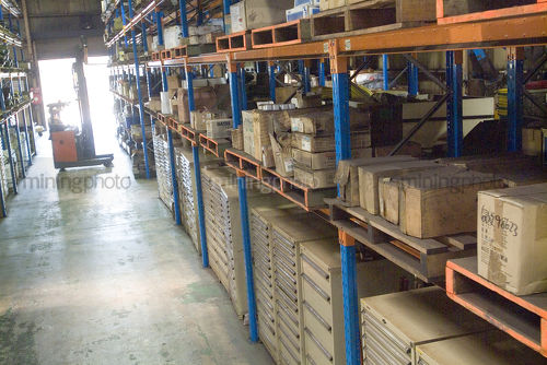 Pallet racking in a warehouse - Mining Photo Stock Library