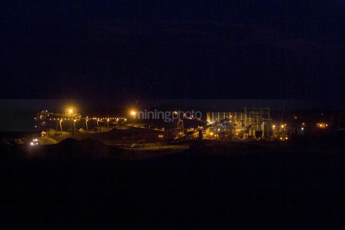 Coal wash plant with plenty of lights shot at dark - Mining Photo Stock Library