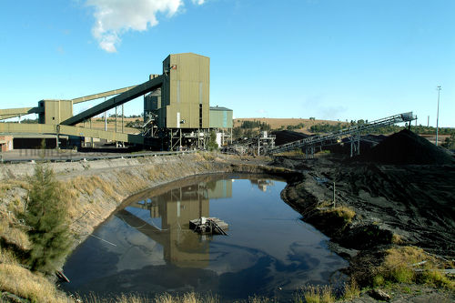 Coal wash plant with water dam in foreground - Mining Photo Stock Library