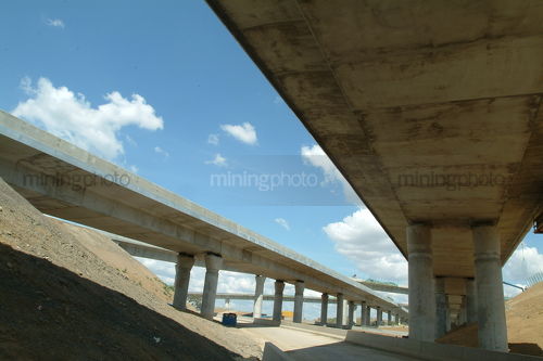 Freeway bridge overpass during construction - Mining Photo Stock Library