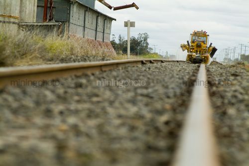 Heavy rail maintenance in rural areas. shot at track level. - Mining Photo Stock Library