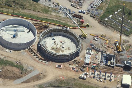 Water treatment sewage plant under construction.  shot from above as aerial - Mining Photo Stock Library