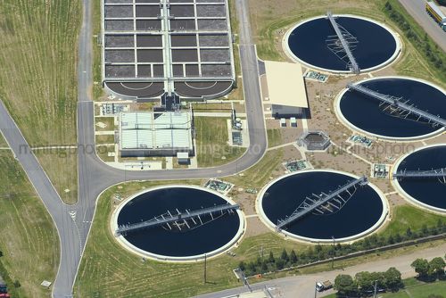 Aerial shot of domestic water treatment plant. lots of ponds. - Mining Photo Stock Library