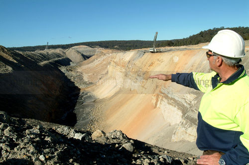 Coal  project engineer manager overseeing blasting pit at open cut coal mine. - Mining Photo Stock Library