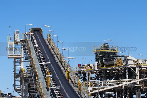 Coal conveyor with wash plant in background. - Mining Photo Stock Library