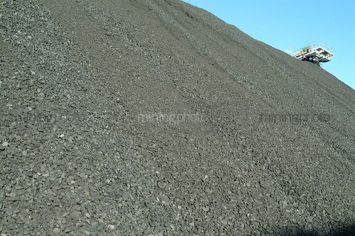 Large stockpile of coal closeup - Mining Photo Stock Library