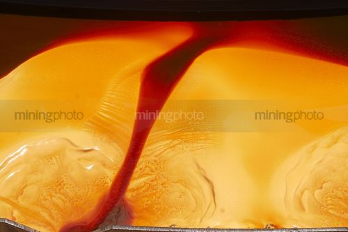 Caustic patern in holding tank - Mining Photo Stock Library