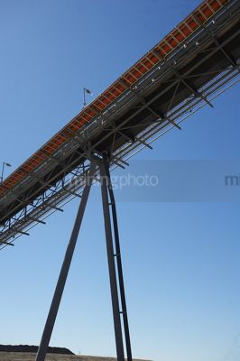 Coal conveyor. vertical image - Mining Photo Stock Library