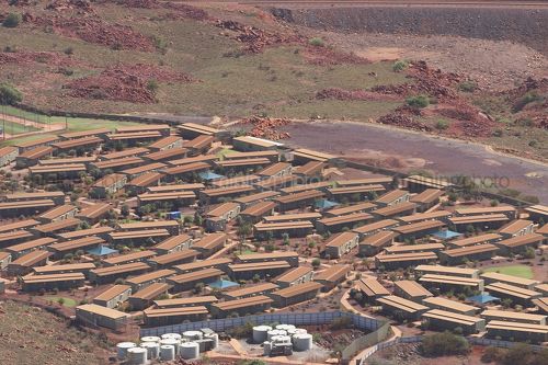 Aerial shot of mine camp in Pilbarra.  photo shows many houses and camp layout. - Mining Photo Stock Library