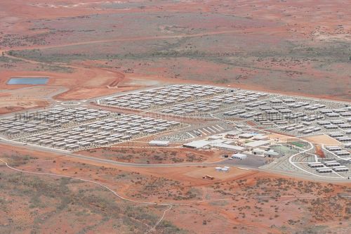 Aerial photo of 3000 person workers camp in iron ore country. - Mining Photo Stock Library