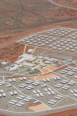 Vertical shot as a close up aerial photo of 3000 person workers camp in iron ore country. - Mining Photo Stock Library