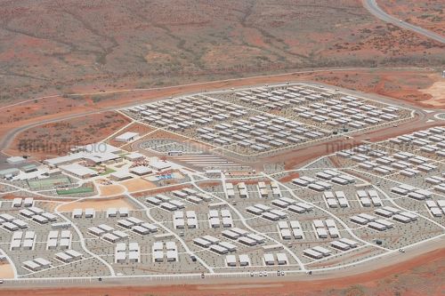 Close up aerial photo of 3000 person workers camp in iron ore country. - Mining Photo Stock Library