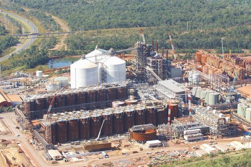 Aerial photo of alumina refinery.  bauxite covered process plant in background. - Mining Photo Stock Library