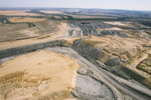 Aerial photo of open cut coal mine and surrounding rahabilitated countryside. - Mining Photo Stock Library