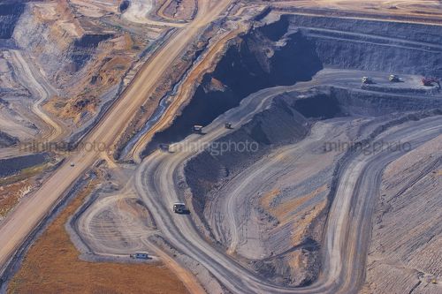 High aerial image of open cut coal mine.  high walls and mine operations clearly seen. - Mining Photo Stock Library