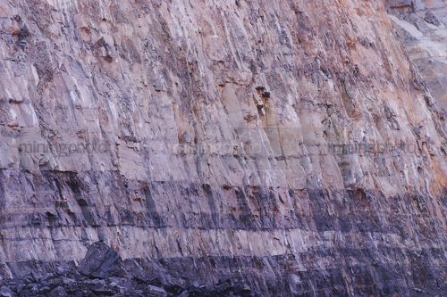 Coal seam in high wall.  open cut coal mine.  close up photo. - Mining Photo Stock Library