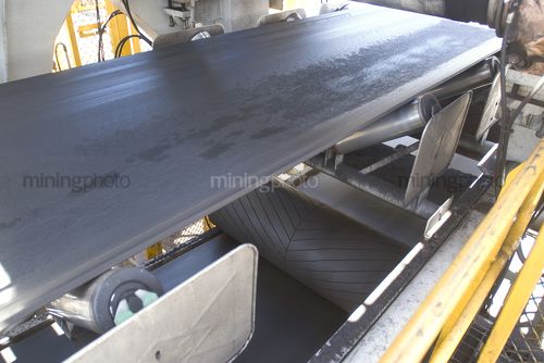 Close up photo of a conveyor. - Mining Photo Stock Library