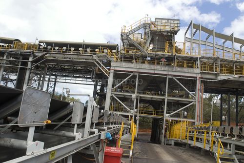 Multi level coal conveyors delivering to stockpile area.  conveyor in the foreground. - Mining Photo Stock Library