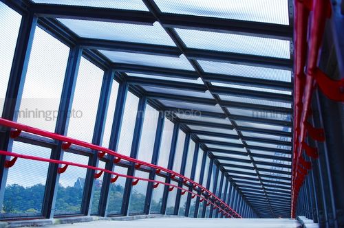 Coloured covered walkway.  fully enclosed. - Mining Photo Stock Library
