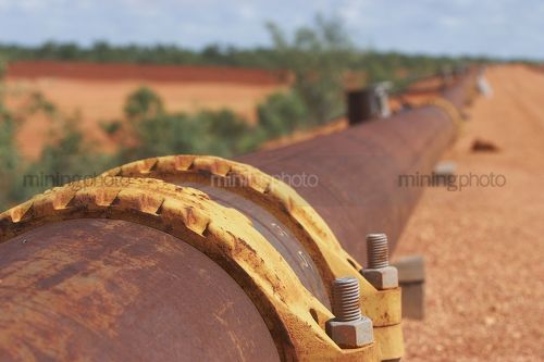 Water pipe in mine site. - Mining Photo Stock Library