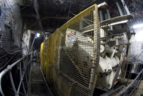 Machinery working in underground coal mine. - Mining Photo Stock Library