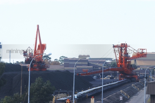 Photo of coal loader / unloader at rail terminal. - Mining Photo Stock Library