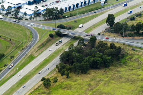 Aerial of road bridge and freeway transport system - Mining Photo Stock Library