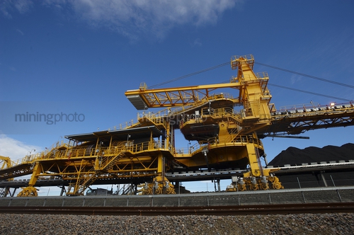 Up close photo of coal shiploader. - Mining Photo Stock Library