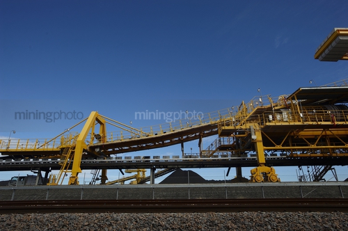 Up close photo of coal shiploader. - Mining Photo Stock Library