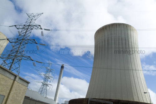 Cooling tower, electricity towers at power station - Mining Photo Stock Library