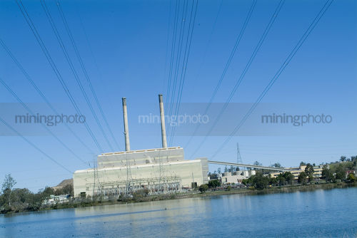Power station shot from the edge of the lake  - Mining Photo Stock Library