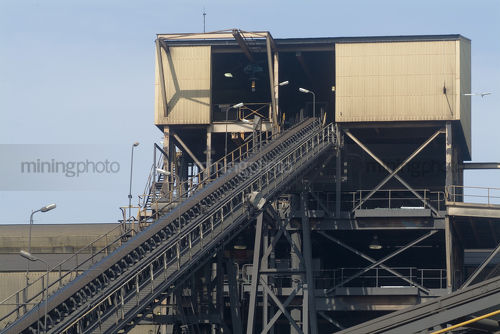 Conveyor leaving wash processing plant - Mining Photo Stock Library