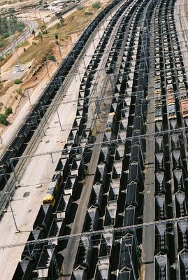 Aerial shot of many coal rail carriages - Mining Photo Stock Library