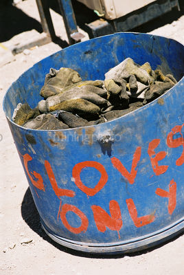 Bin of gloves on mine site - Mining Photo Stock Library