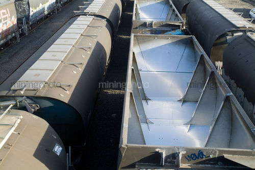 Heavy rail train carriages at coal port - Mining Photo Stock Library