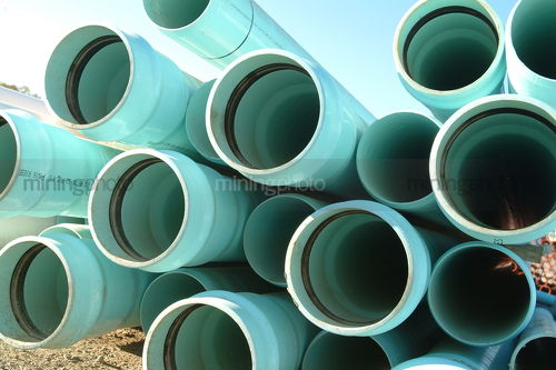 Water pipes shot end on - Mining Photo Stock Library