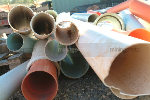 Old broken stormwater pipes shot end on - Mining Photo Stock Library