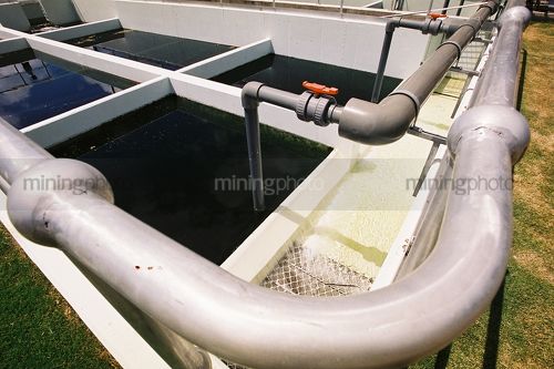 Pipes on water treatment plant. - Mining Photo Stock Library
