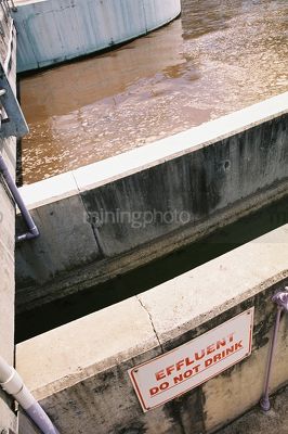 Concrete separation sewage water tank at treatment plant. - Mining Photo Stock Library