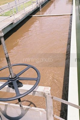 Water separation tank at treatment works - Mining Photo Stock Library