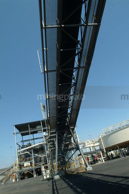 High conveyor from processing plant to stockpile - Mining Photo Stock Library