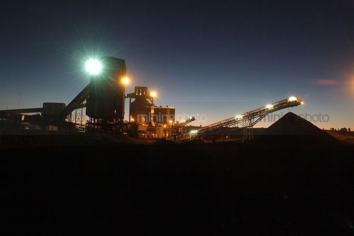 Coal wash plant with lights on at dusk - Mining Photo Stock Library
