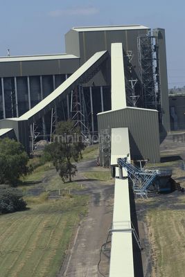 Conveyors into coal fired power station. vertical shot. - Mining Photo Stock Library